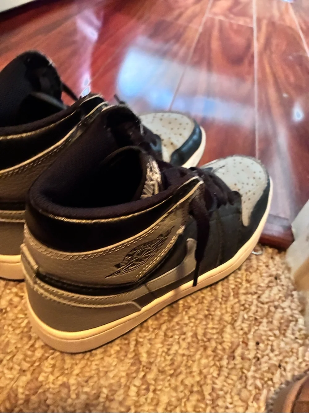 Jordan Women's High-Top Sneakers in Black and Gray